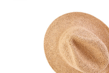 Fototapeta na wymiar Wicker straw flaxen hat with red ribbon on isolated white background. Fashion accessory. Female summer hat.