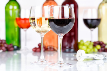 Red wine in a glass grapes