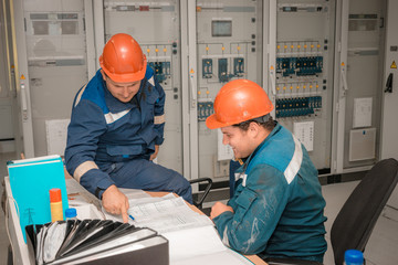 Electricians at the substation