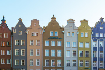 Fototapeta premium Long Market Street, typical colorful decorative medieval old houses, Royal Route Architecture of Mariacka street is one of most notable tourist attractions. Flat design.