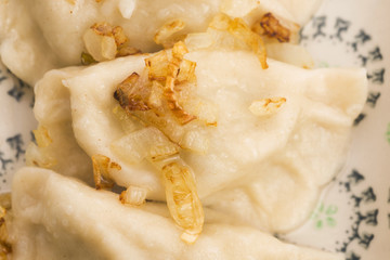 Polish pierogi filled with cabbage and mushrooms