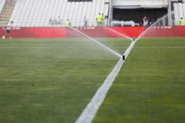 watering the football field