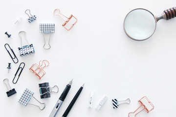 White office desk table with office supplies. Top view.