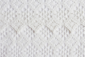 White lace pattern on cloth in vintage style frame