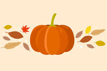 Pumpkin and autumn leaves.