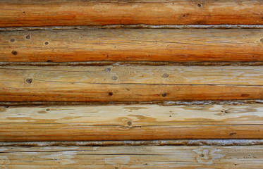 Fototapeta premium texture of the wooden logs lie in the dol yellow color