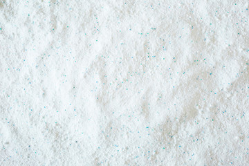 White powder. Detergent for clothes regular washing. Empty place for text or logo. Top view.