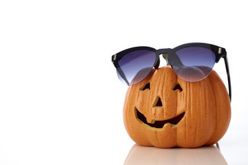 Fototapeta premium pumpkin jack lantern with sunglasses