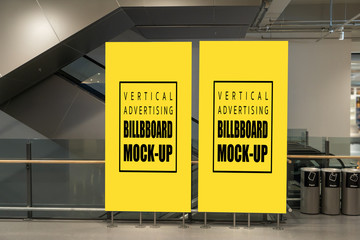 Mock up two vertical billboard on metal stand near escalator