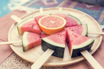 A dish of sliced watermelons