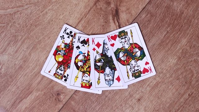 Four kings of playing cards