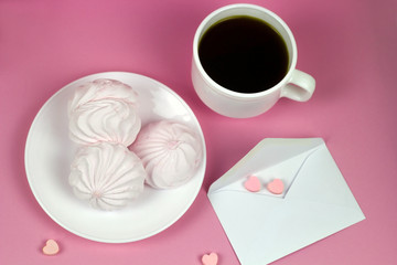 berry zephyr and coffee cup on a pink background