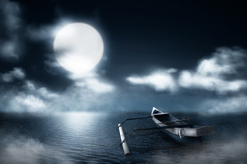 Fototapeta na wymiar Wooden boat on the misty lake