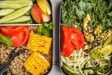 Healthy meal prep containers with quinoa, avocado, corn, zucchini noodles and kale. Takeaway food.