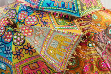 Colorful handmade umbrellas made with knitting