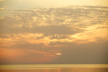 The sea the morning  amidst the clouds and the sky is beautiful quiet atmosphere feeling lonely