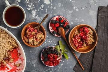 Breakfast with coffee and crumble pie, dark background, healthy vegan breakfast concept.