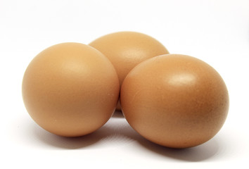 three eggs isolated on white background
