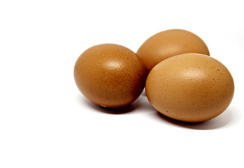 three eggs isolated on white background