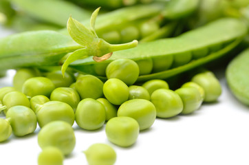 Pods of green peas isolated on a white background. Green, ripe, fresh vegetables. Legumes.