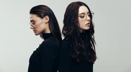 Female models in black outfit and glasses © Jacob Lund