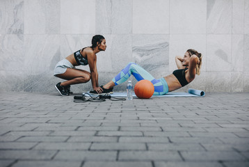 Women doing workout outdoors