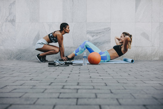 Women doing workout outdoors