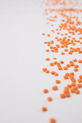 Kidney beans scattered over white background