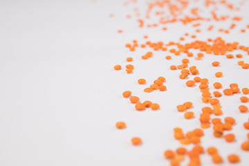 Kidney beans scattered over white background