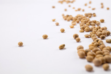 Beans scattered over white background