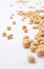 Beans scattered over white background