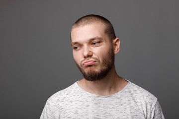 Fototapeta premium portrait of dissatisfied young man