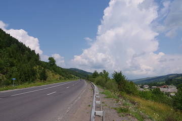 mountain slopes green trees and mountains