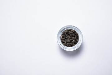 Macro view of natural organic sunflower seeds on background