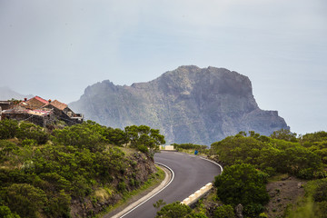 Mountain serpentine. Landscape of the Masca Gorge. Beautiful views of the coast with small villages in Tenerife, Canary Islands