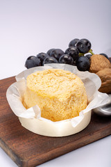 French Langres soft cows crumbly cheese with washed rind structure made in Champagne - Ardenne region