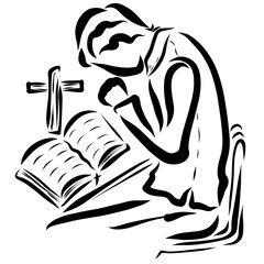 Bible with a cross on the table and a praying young man