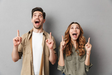 Portrait of a happy young couple standing together
