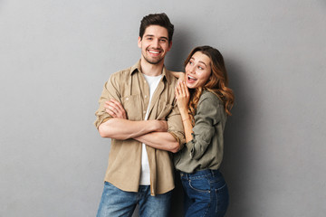 Portrait of a cheerful young couple standing together