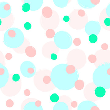 Repeated scattered round colored spots painted with watercolour brush. Cute girly seamless pattern. Sketch, grunge, watercolor.