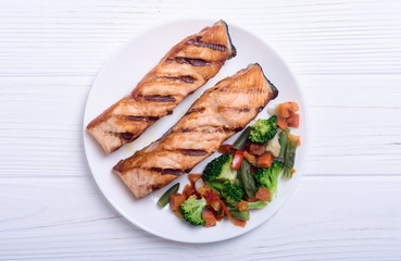 Grilled salmon fish with vegetables