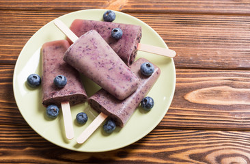 Popsicle with blueberries and yogurt