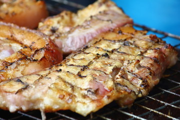 delicious food pork grilling on hot charcoal