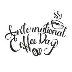 International Coffee Day. 1 October. Food event concept. Lettering handmade with the name of the event inscribed in the cup.