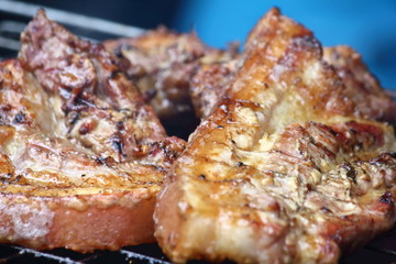 delicious food pork grilling on hot charcoal