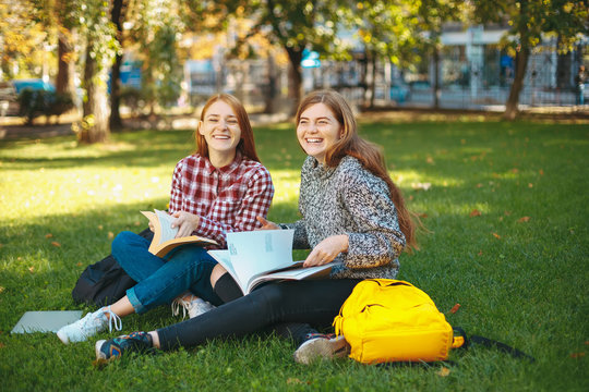 Students have fun outdoors on campus at the university