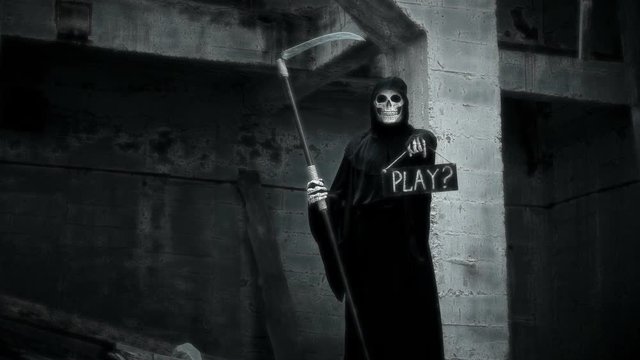 death with a scythe raises a sign with the inscription play?
