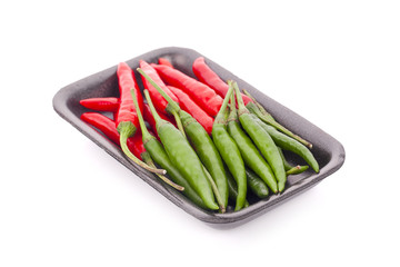 Red and green chili pepper with isolated white background