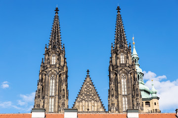 Fototapeta na wymiar St Vitus cathedral spires closeup shot against sky