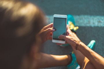 Woman with mobile phone, sport and workout